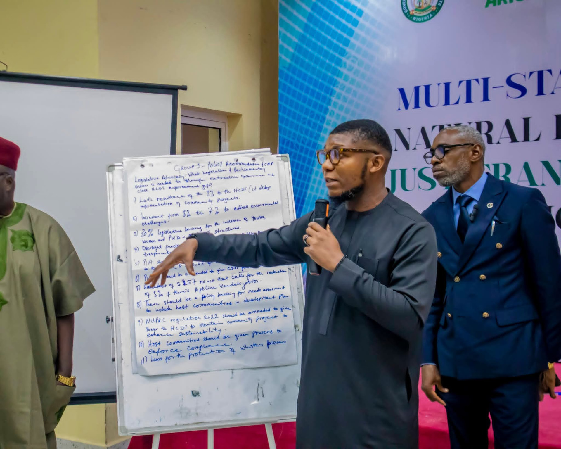 Comrade Ini-obong Uko presenting Group One recommendations at the multi-stakeholder dialogue in Uyo